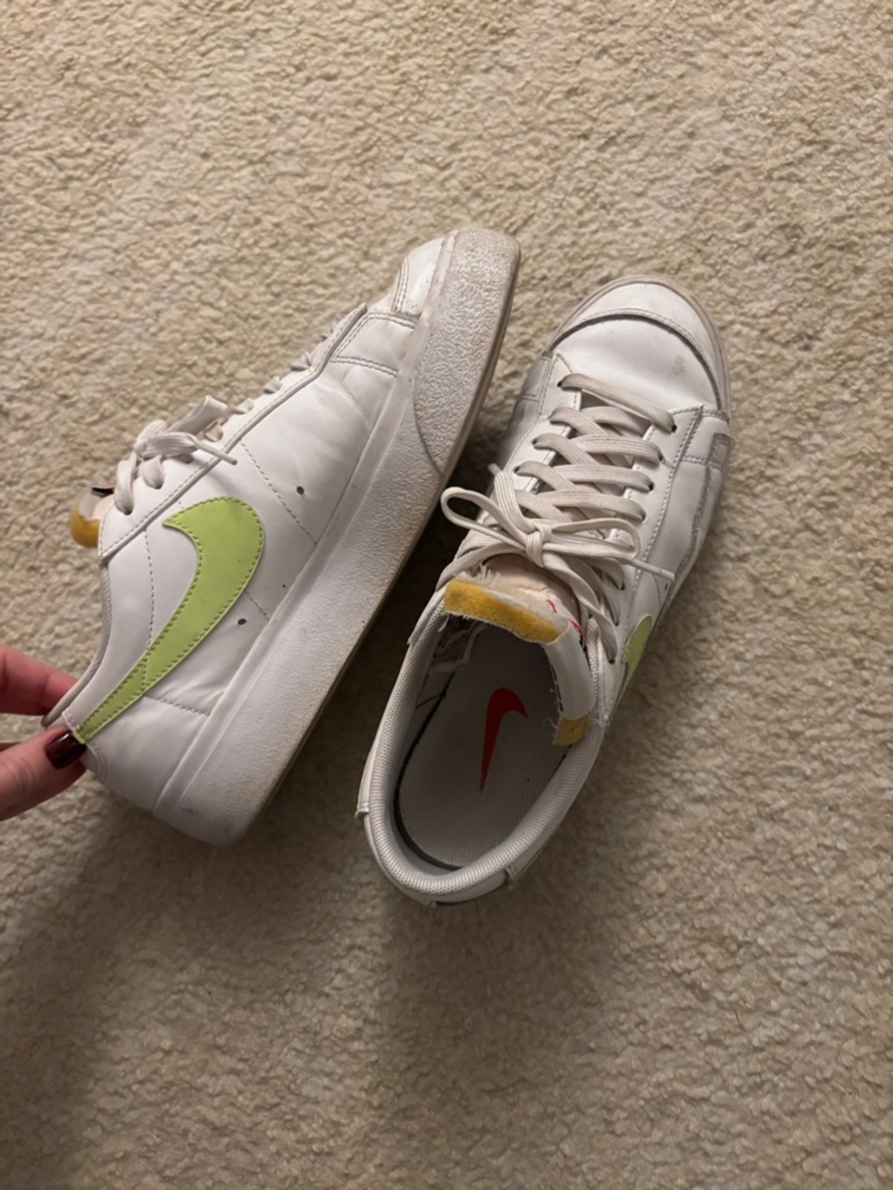 Nike White Sneakers with Lime Swoosh and Red Insole Accent